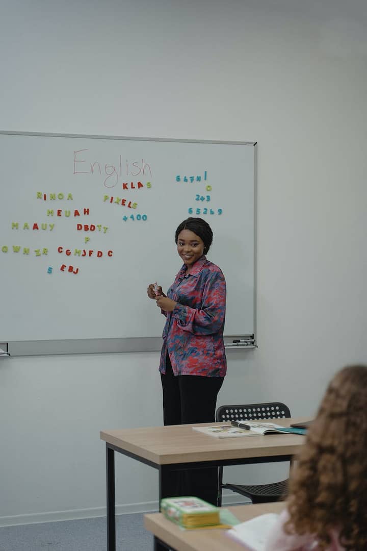 teacher standing in front of a class